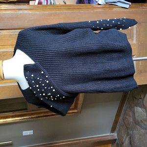 V neck Sweater with pearl embellishments. F110